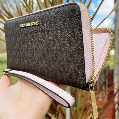 michael kors wristlet wallet with phone holder|Michael Kors wristlet sale.